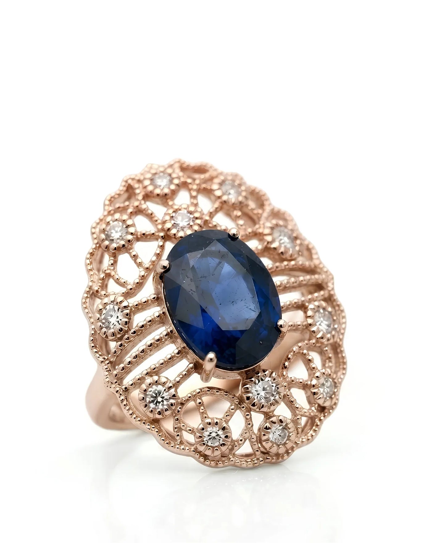 Oval blue sapphire ring with antique filigree diamond accents in 18K rose gold | SARATTI