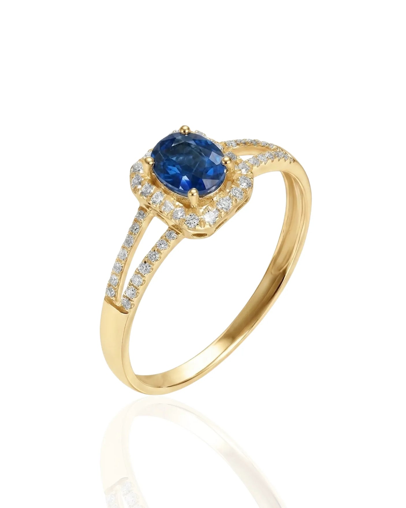 Oval blue sapphire ring with diamond halo and split shank in 18K yellow gold | SARATTI
