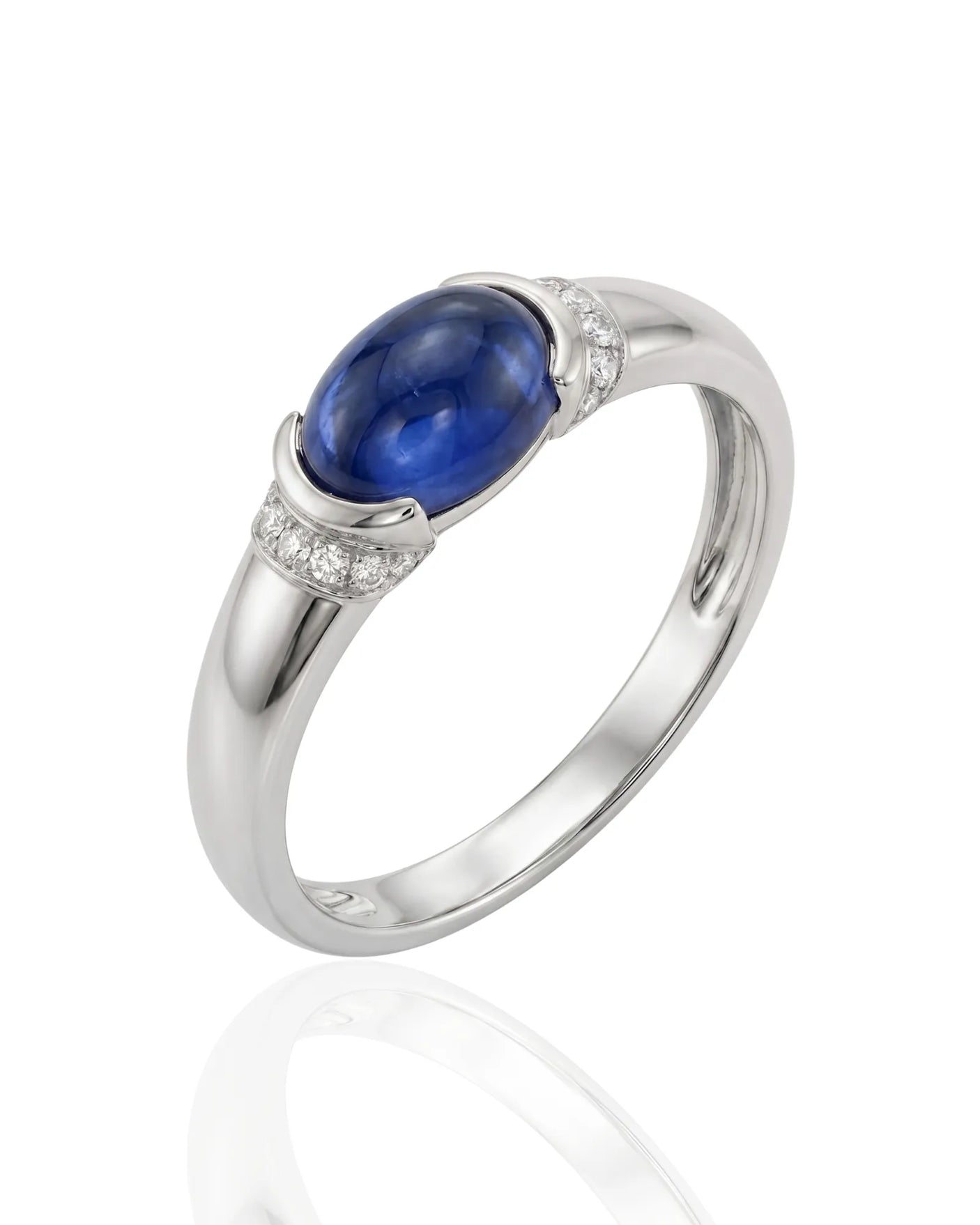 Oval blue sapphire ring with diamond shoulder accents in 18K white gold | SARATTI