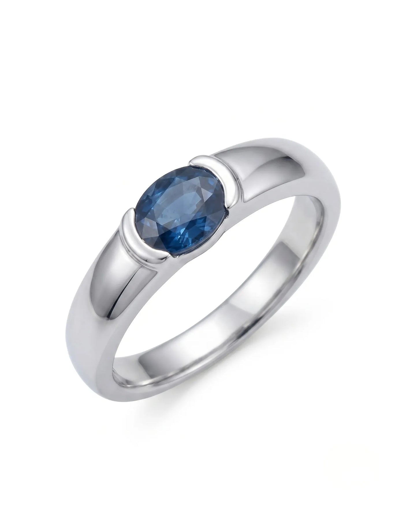 Oval blue sapphire ring with modern bezel setting in 18K white gold | SARATTI