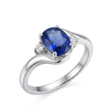 Blue Sapphire and Diamond Promise Ring Oval Twisted Shank