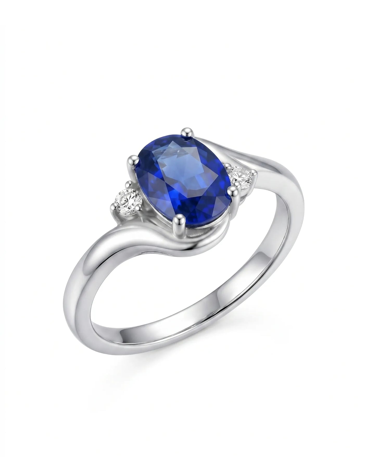 Oval blue sapphire ring with twisted shank and round diamonds in 18K white gold | SARATTI
