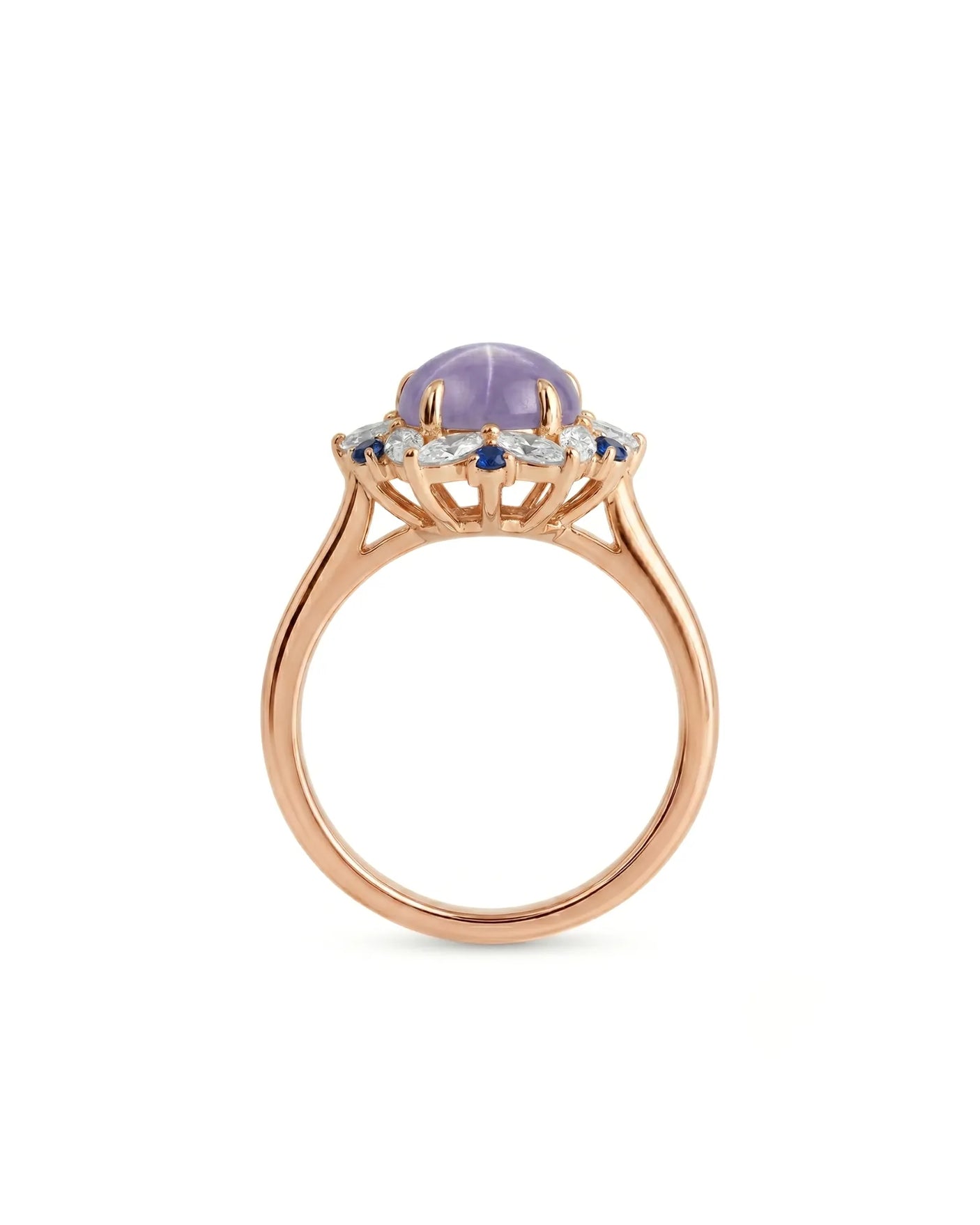 Oval cabochon natural star sapphire ring with blue sapphire accents in 18K rose gold | SARATTI