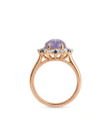 Oval cabochon natural star sapphire ring with blue sapphire accents in 18K rose gold | SARATTI
