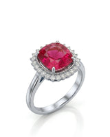 Oval crimson tourmaline ring with diamond halo in 18K white gold | SARATTI