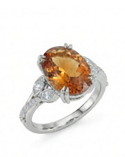 Oval cut Natural Imperial Topaz diamond leaf setting in 18K white gold | SARATTI