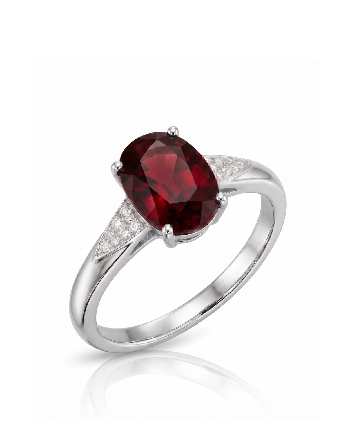 Oval deep red garnet ring with tapered diamond shoulders in 18K white gold | SARATTI