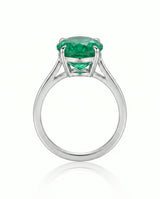 Oval emerald solitaire ring in 18K white gold | SARATTI
