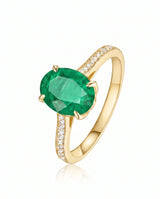 Oval emerald solitaire ring in 18K yellow gold | SARATTI
