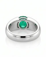 Oval emerald solitaire signet ring in 18K white gold | SARATTI