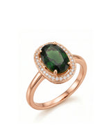 Oval green tourmaline ring with diamond halo in 18K rose gold | SARATTI