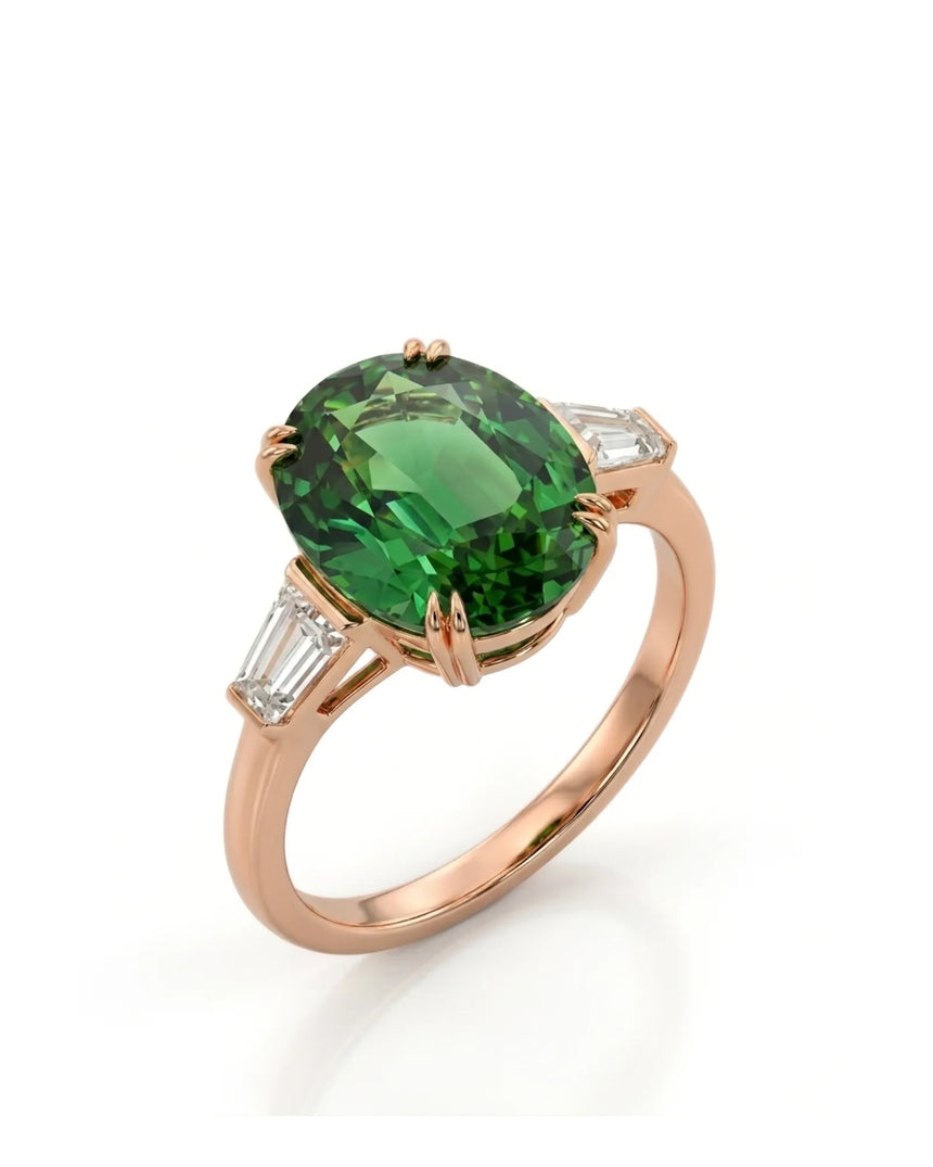 Oval green tourmaline ring with emerald-cut diamond side stones in 18K rose gold | SARATTI