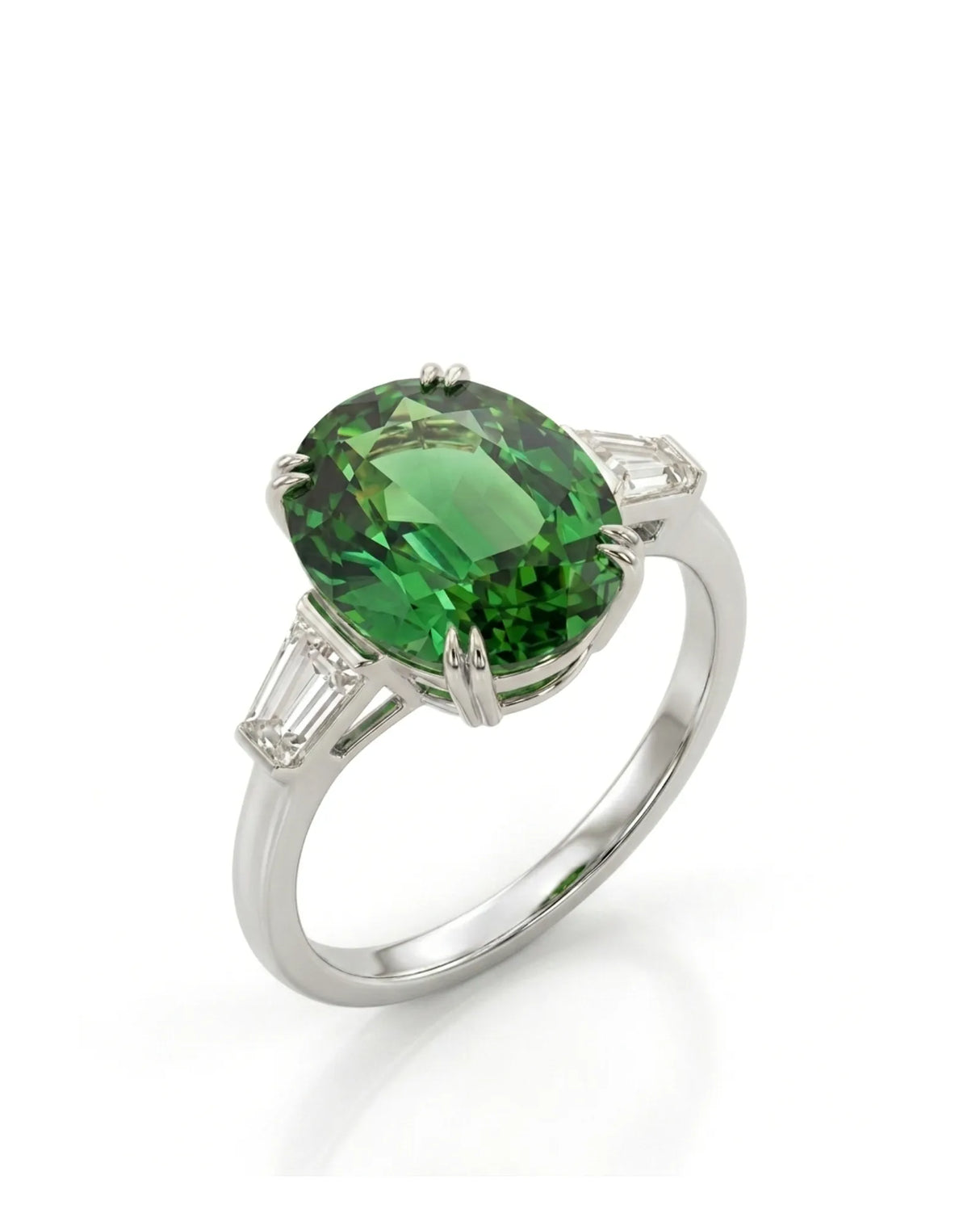Oval green tourmaline ring with emerald-cut diamond side stones in polished platinum | SARATTI