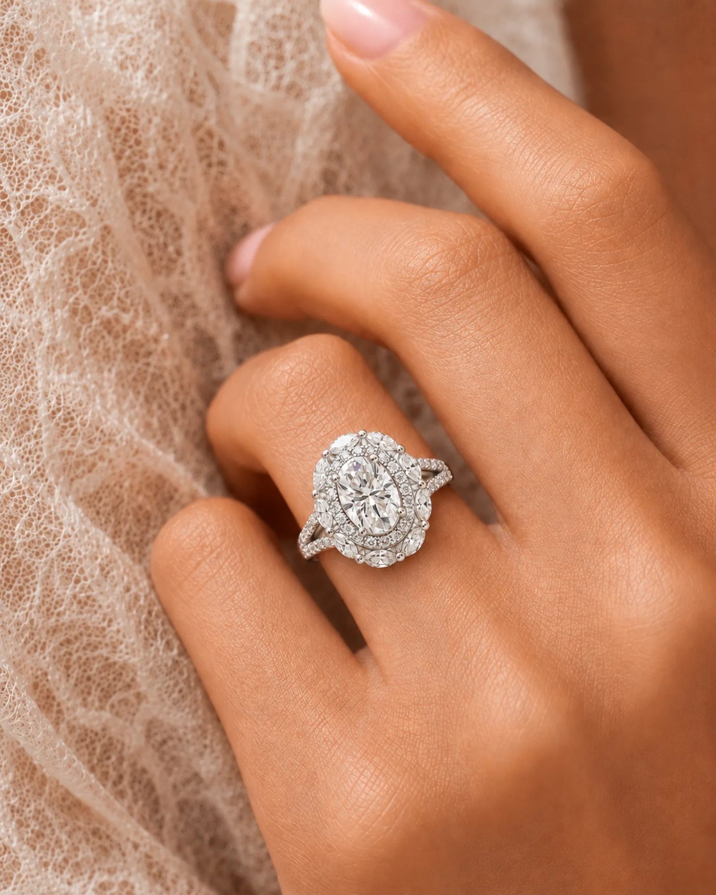 Oval halo moissanite engagement ring for a romantic proposal in polished white gold | SARATTI
