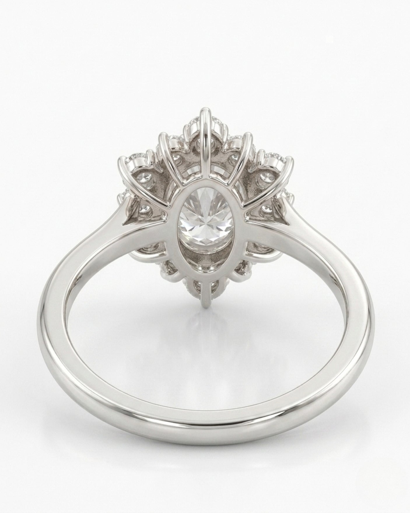 Oval halo moissanite engagement ring for a soft romantic proposal in 18K white gold | SARATTI