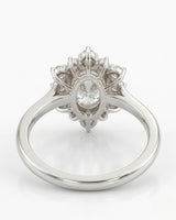 Oval halo moissanite engagement ring for a soft romantic proposal in 18K white gold | SARATTI