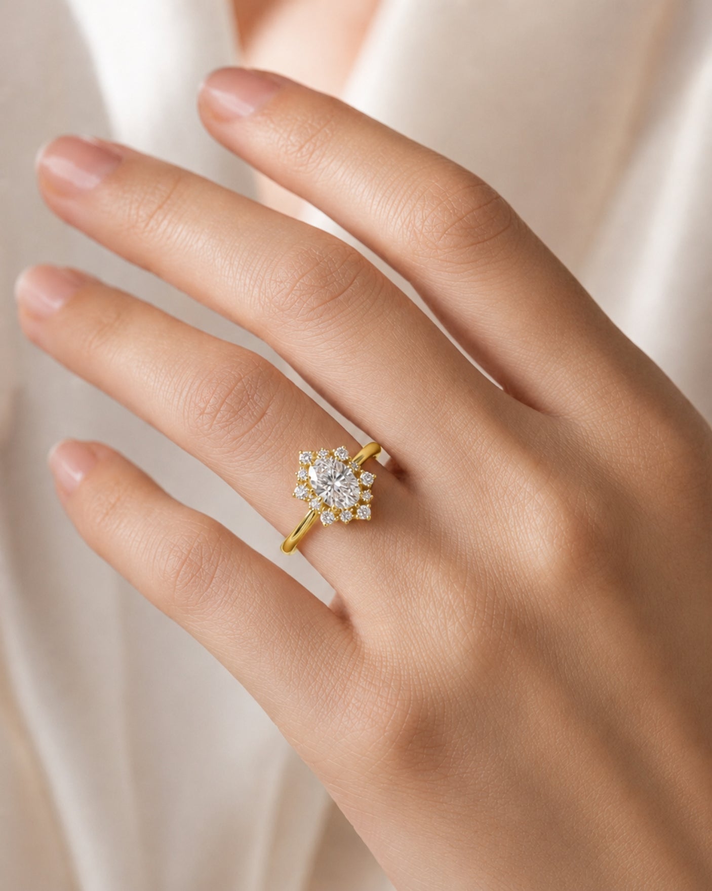 Oval halo moissanite engagement ring for a warm romantic proposal in 18K yellow gold | SARATTI