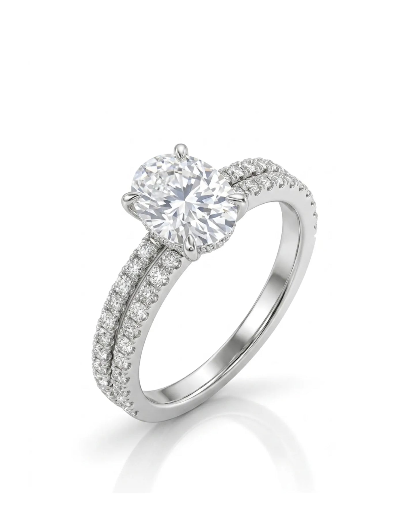 Oval moissanite bridal set with hidden halo, pavé engagement ring, and matching 18K white gold wedding band | SARATTI