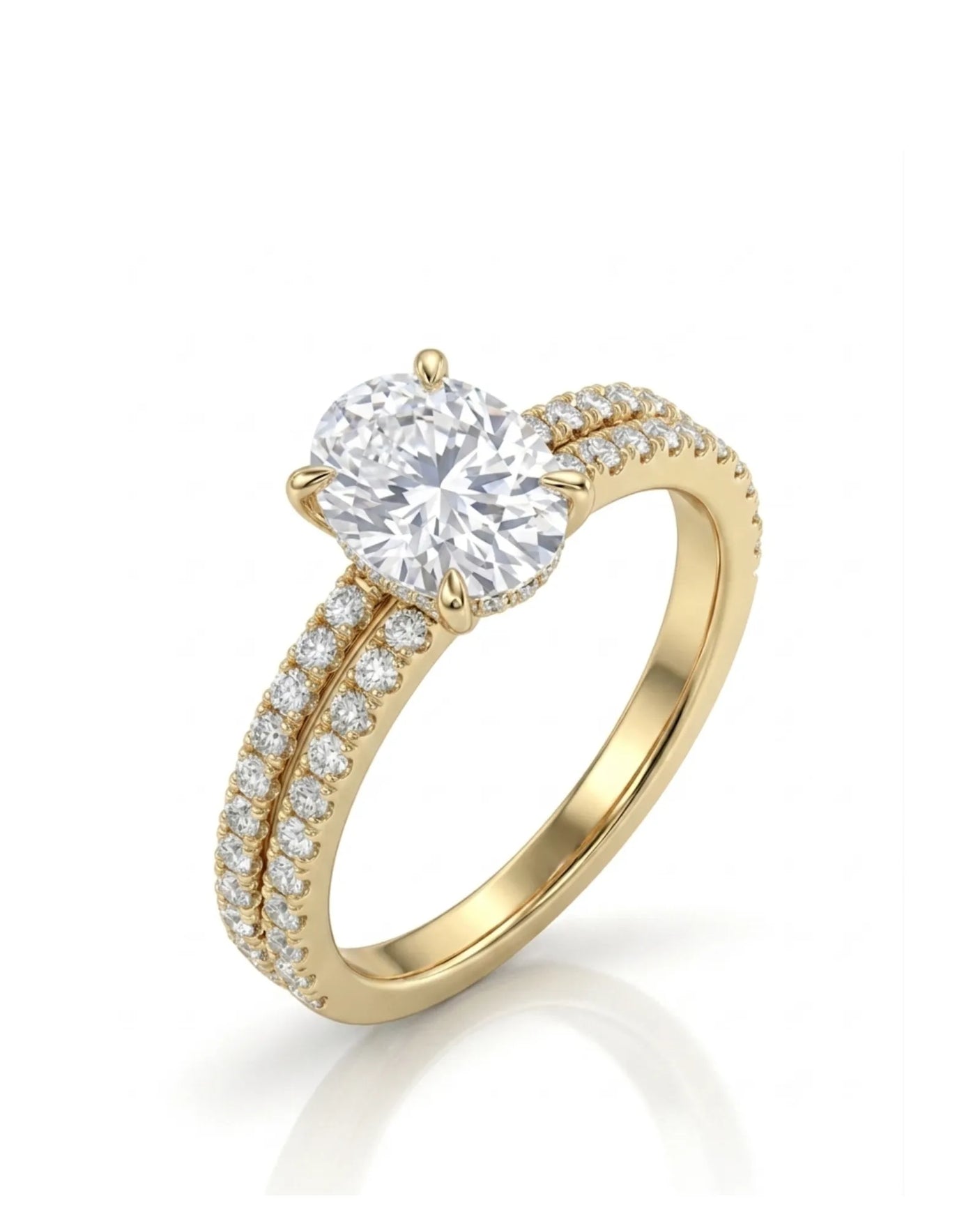 Oval moissanite bridal set with hidden halo, pavé engagement ring, and matching 18K yellow gold wedding band | SARATTI