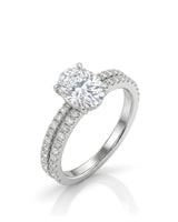 Oval moissanite bridal set with hidden halo, pavé engagement ring, and matching polished platinum wedding band | SARATTI