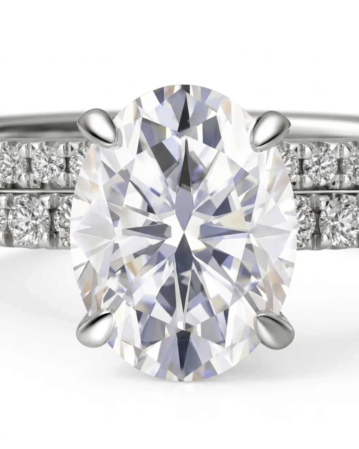 Oval moissanite engagement and wedding ring set with hidden halo crafted in 18K white gold | SARATTI