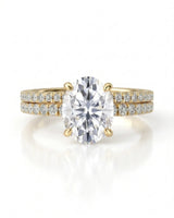 Oval moissanite engagement and wedding ring set with hidden halo crafted in 18K yellow gold | SARATTI