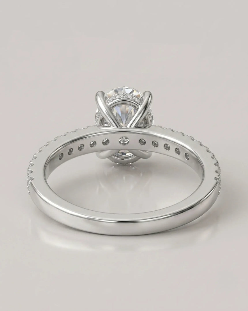 Oval moissanite engagement and wedding ring set with hidden halo crafted in enduring platinum | SARATTI