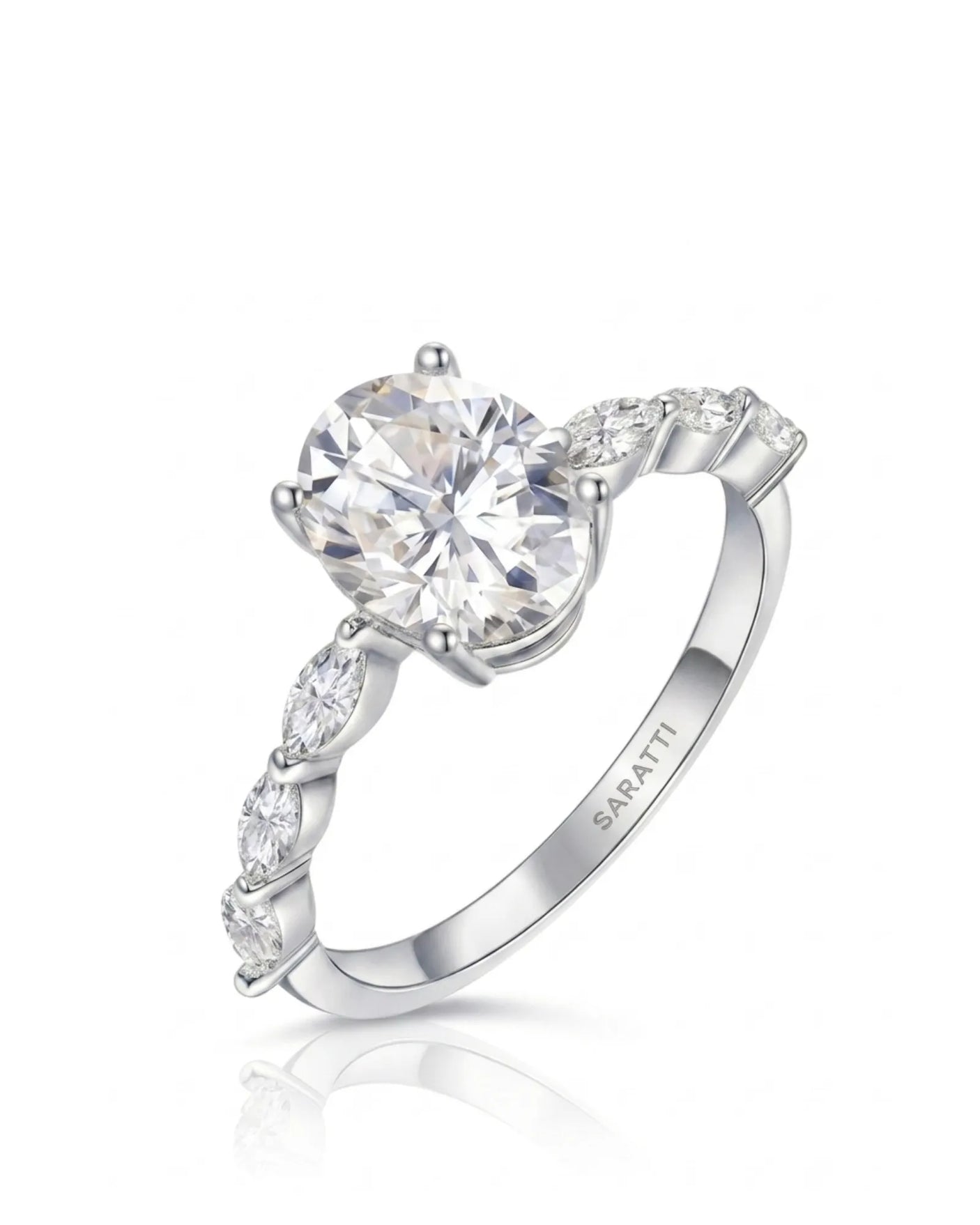 Oval moissanite engagement ring with six marquise side stones and hidden halo in 18K white gold | SARATTI