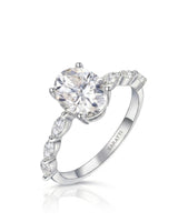 Oval moissanite engagement ring with six marquise side stones and hidden halo in polished platinum | SARATTI