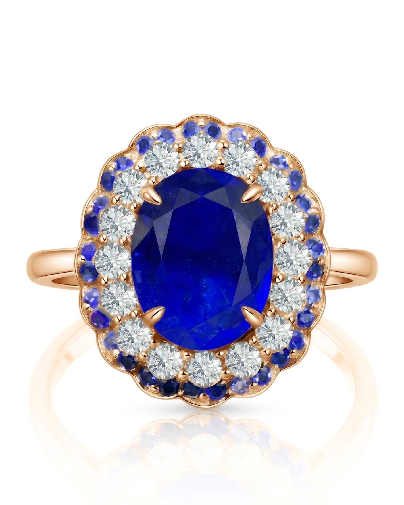 Oval natural sapphire ring framed by round diamonds and blue sapphires in 18K rose gold | SARATTI