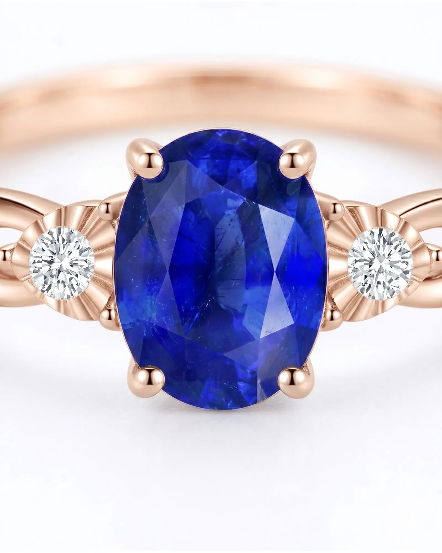 Oval natural sapphire ring with round side diamonds in 18K rose gold - SARATTI