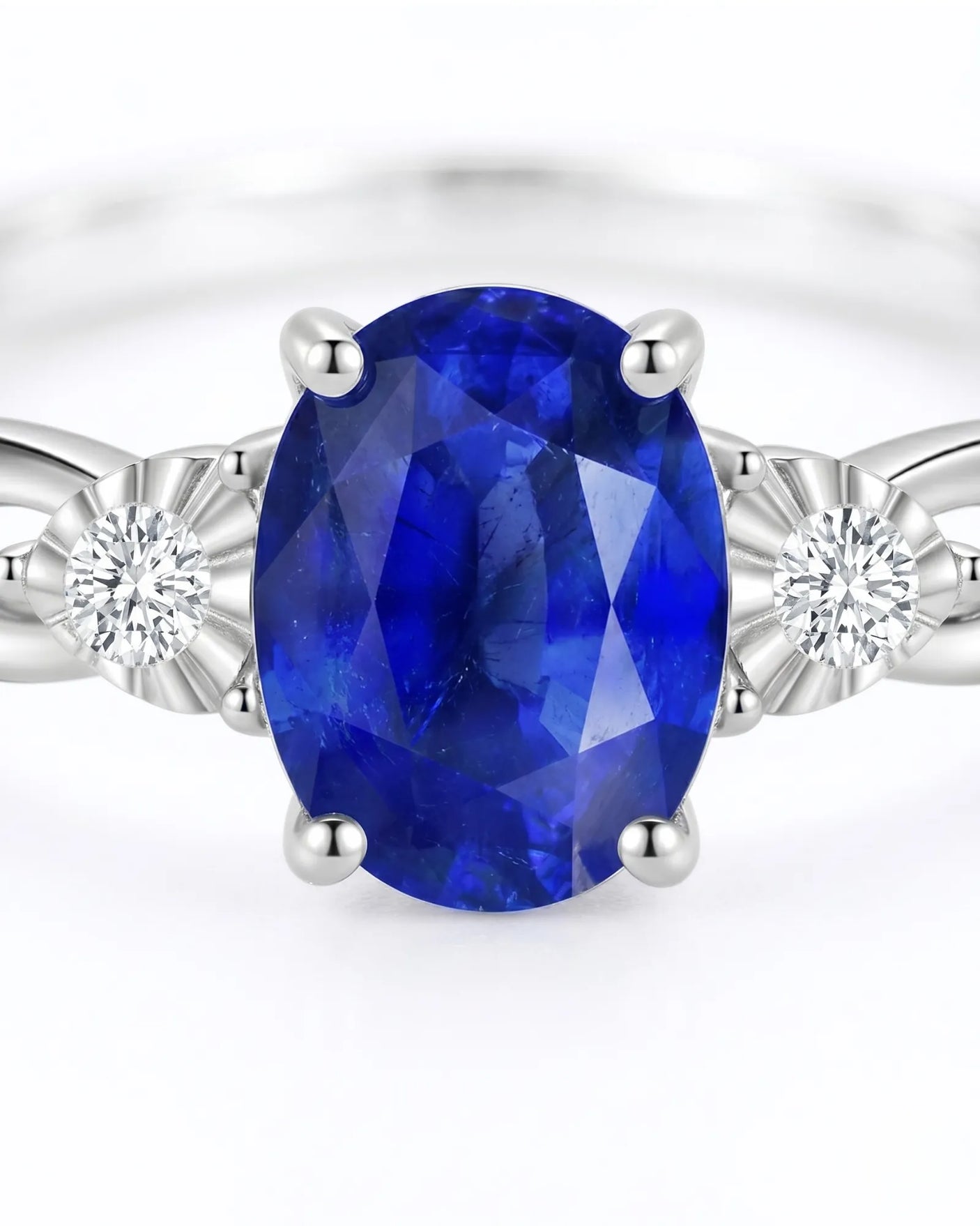 Oval natural sapphire ring with round side diamonds in 18K white gold - SARATTI