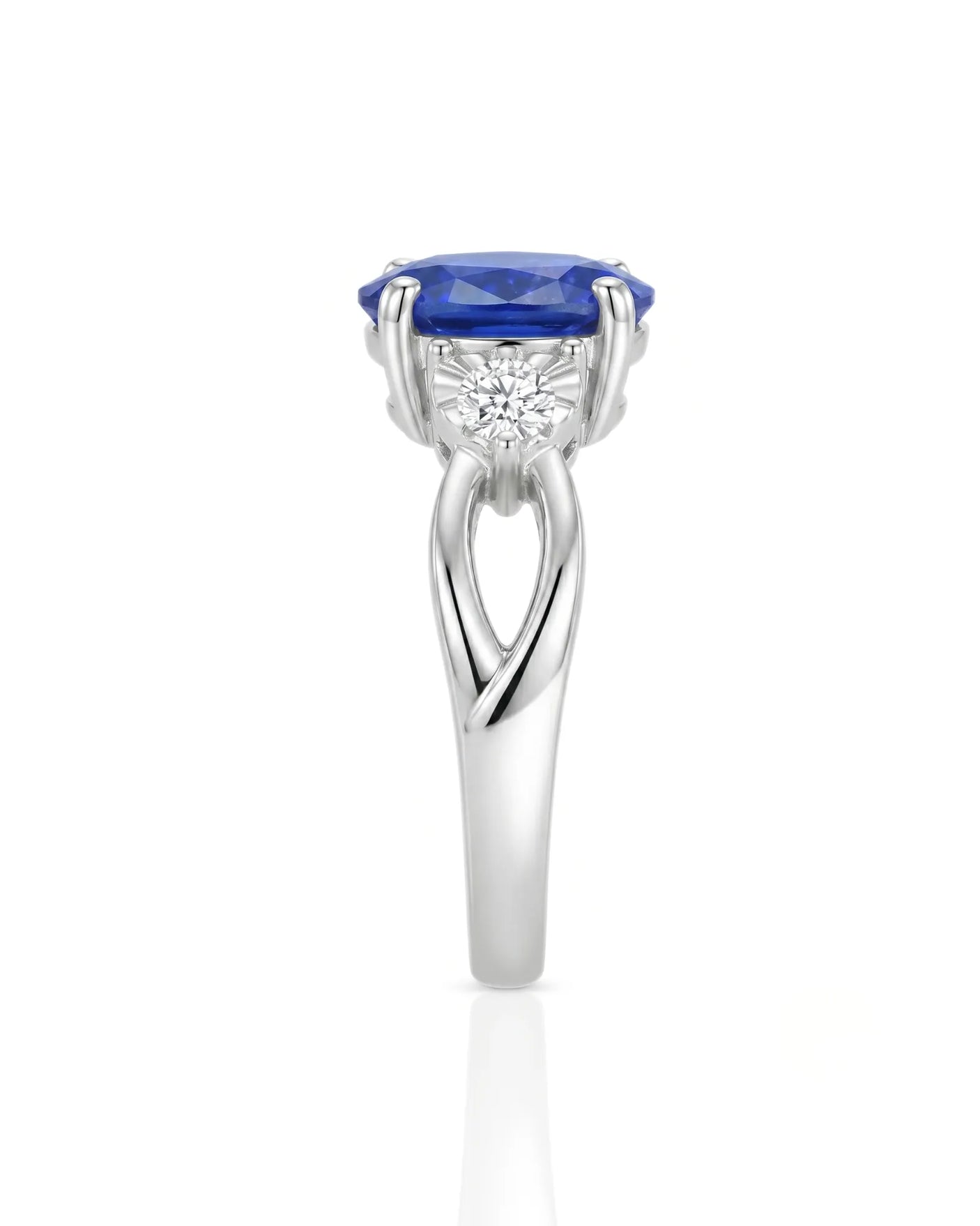 Oval natural sapphire ring with round side diamonds in 18K white gold | SARATTI