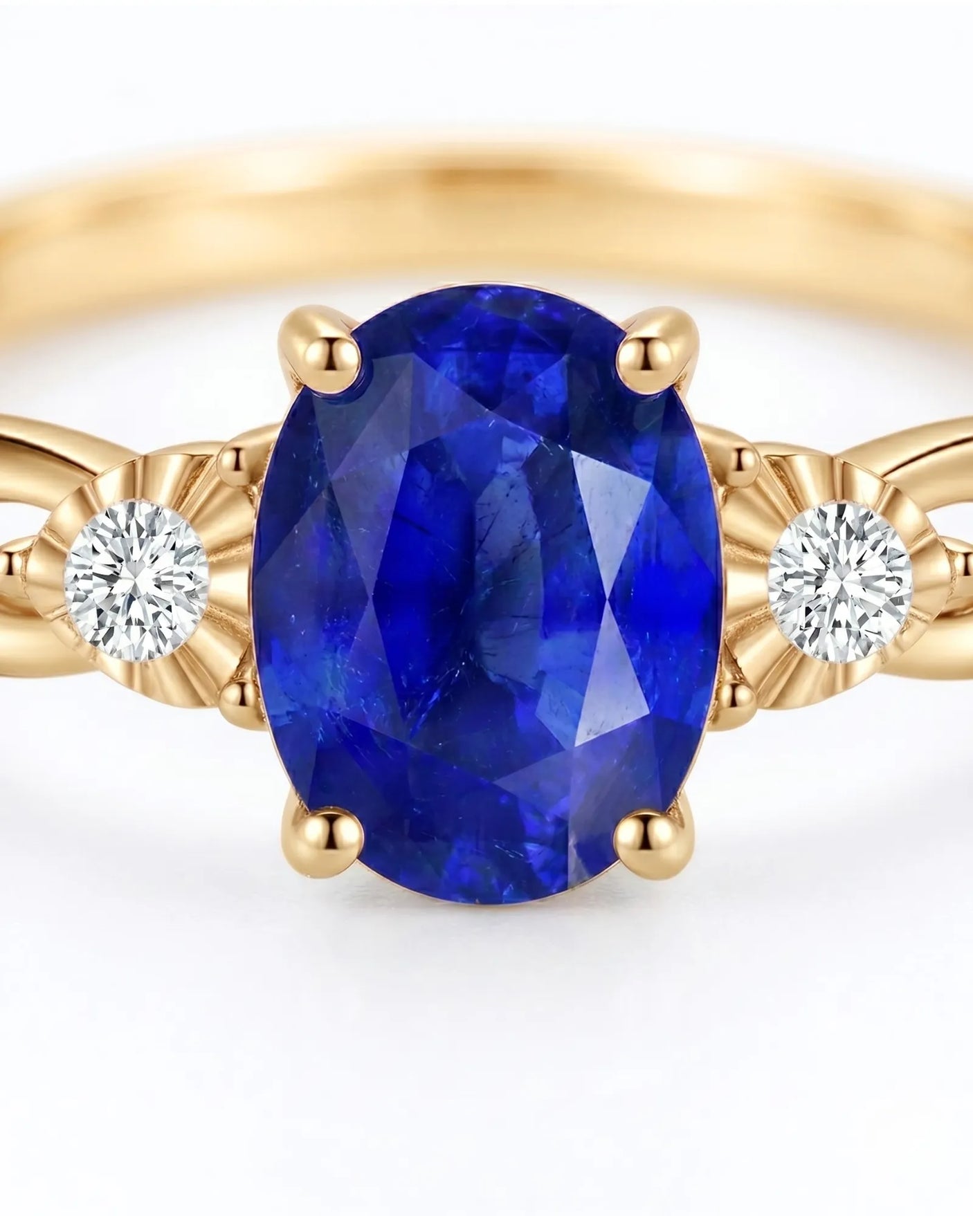 Oval natural sapphire ring with round side diamonds in 18K yellow gold - SARATTI