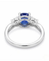 Oval natural sapphire ring with round side diamonds in polished platinum - SARATTI