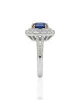 Oval natural sapphire statement ring with diamond halo in Platinum | SARATTI