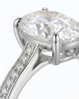 Oval pavé moissanite engagement ring for a refined proposal in 18K white gold | SARATTI