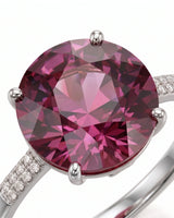Oval pink tourmaline engagement ring with diamond accents in platinum | SARATTI