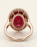 Oval red rubellite tourmaline ring with sparkling diamond accents in 18K rose gold | SARATTI