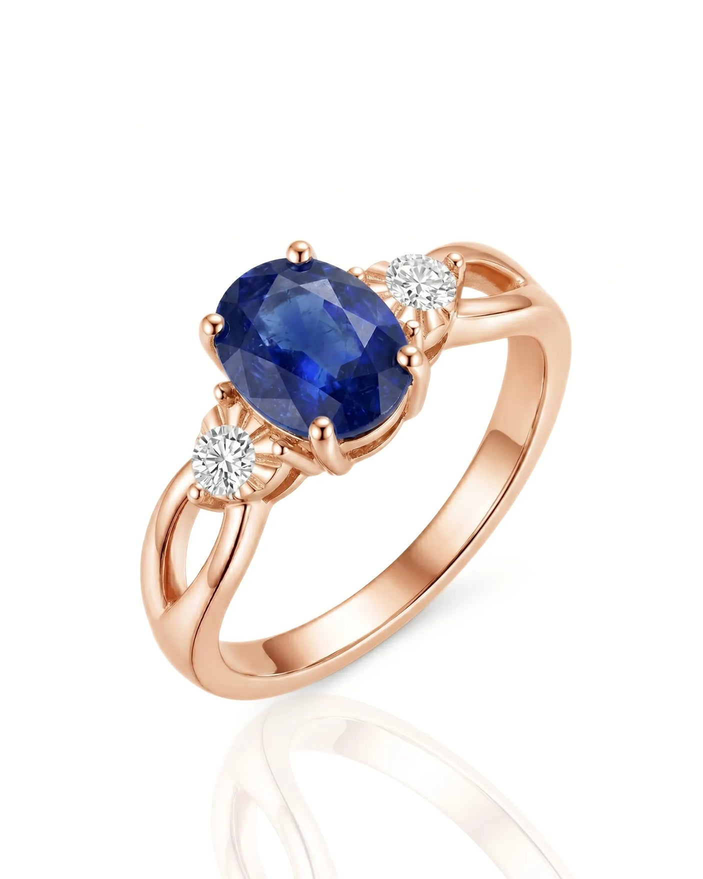 Oval royal blue sapphire and diamond three stone ring in 18K rose gold | SARATTI