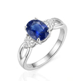 Oval Royal Blue Sapphire and Diamond Three Stone Ring