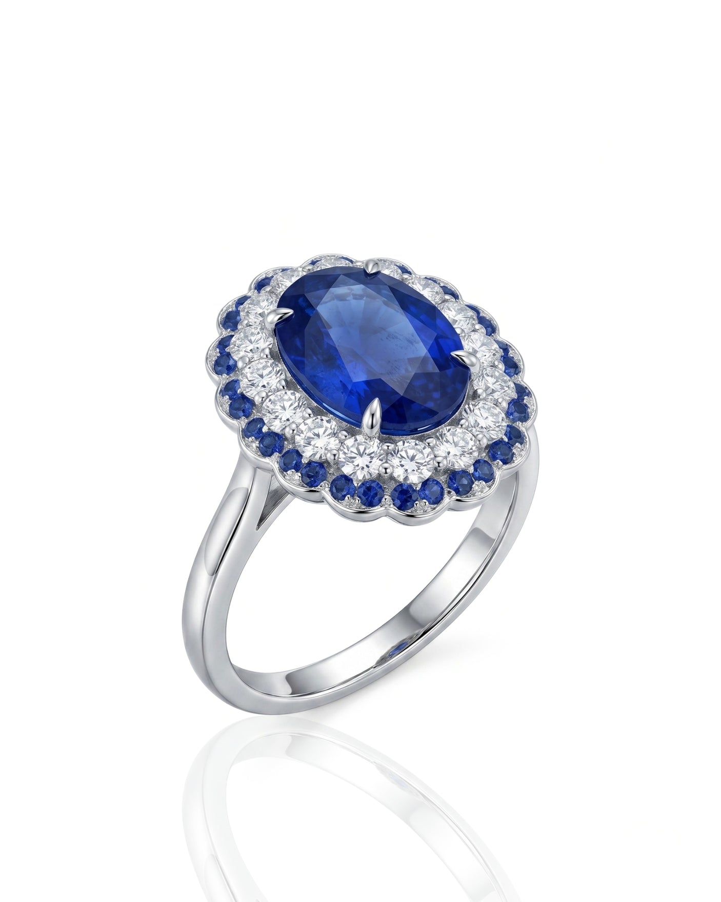 Oval royal blue sapphire double halo ring with diamond accents in polished platinum | SARATTI
