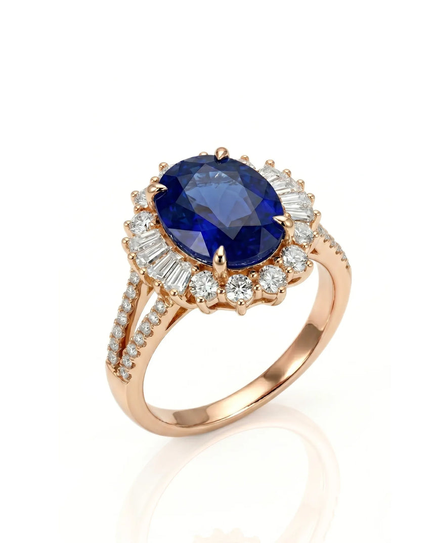 Oval royal blue sapphire ring with diamond halo and split shank in 18K rose gold | SARATTI