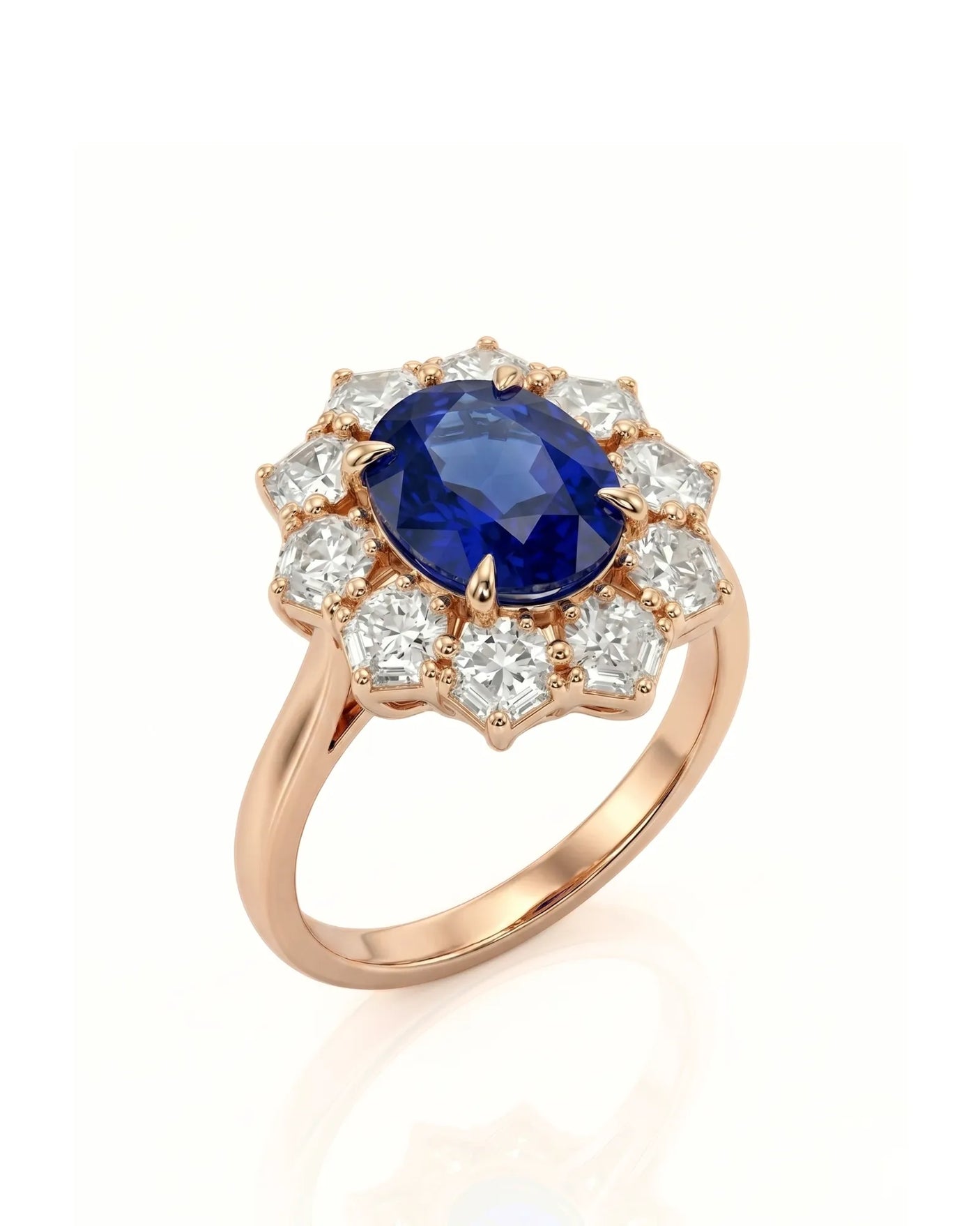 Oval royal blue sapphire ring with floral diamond halo in 18K rose gold | SARATTI