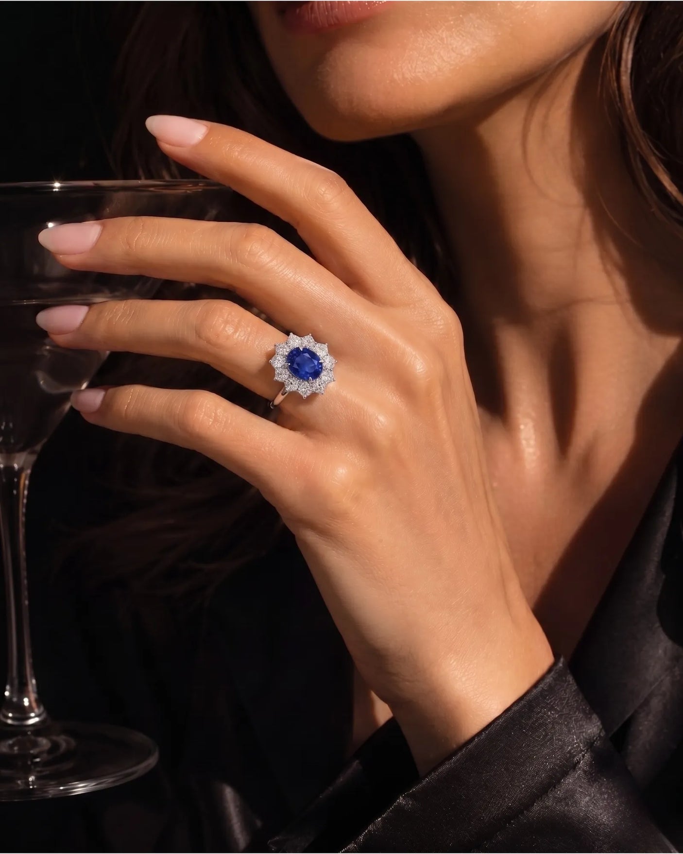 Oval royal blue sapphire ring with floral diamond halo in platinum - SARATTI