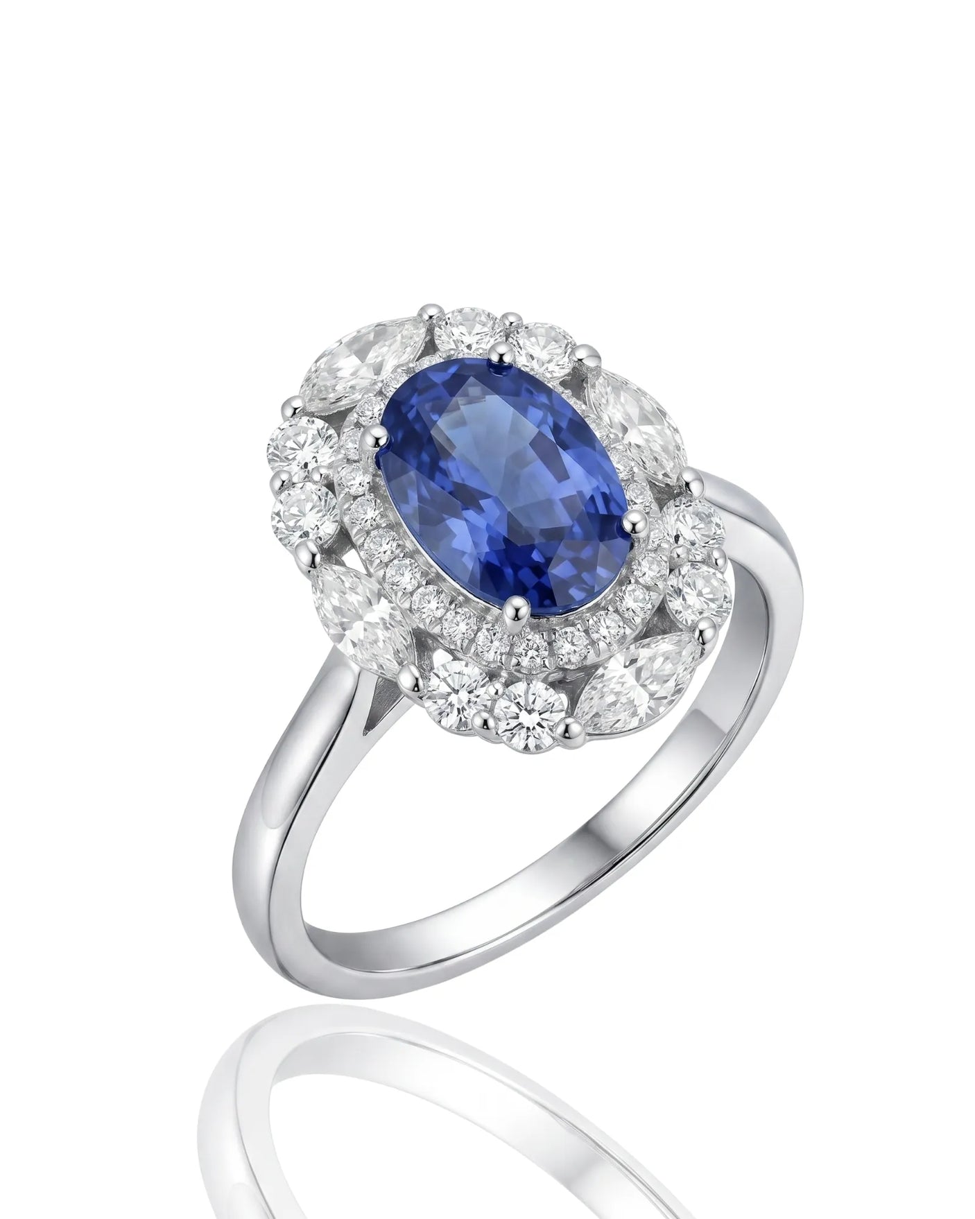 Oval royal blue sapphire ring with round diamond halo in polished platinum | SARATTI