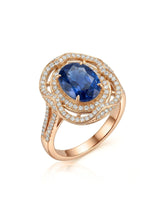 Oval royal blue sapphire ring with triple diamond halo in 18K rose gold | SARATTI