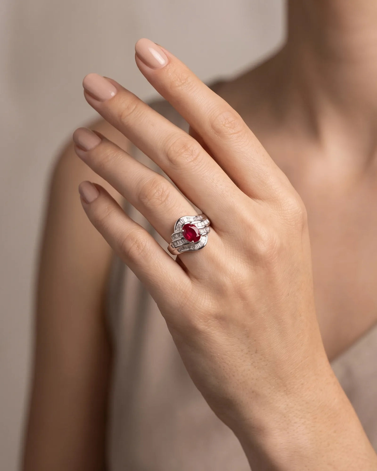 Oval ruby diamond ring in platinum with four-prong centre and architectural wave setting | SARATTI