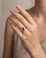 Oval ruby diamond ring in platinum with four-prong centre and architectural wave setting | SARATTI