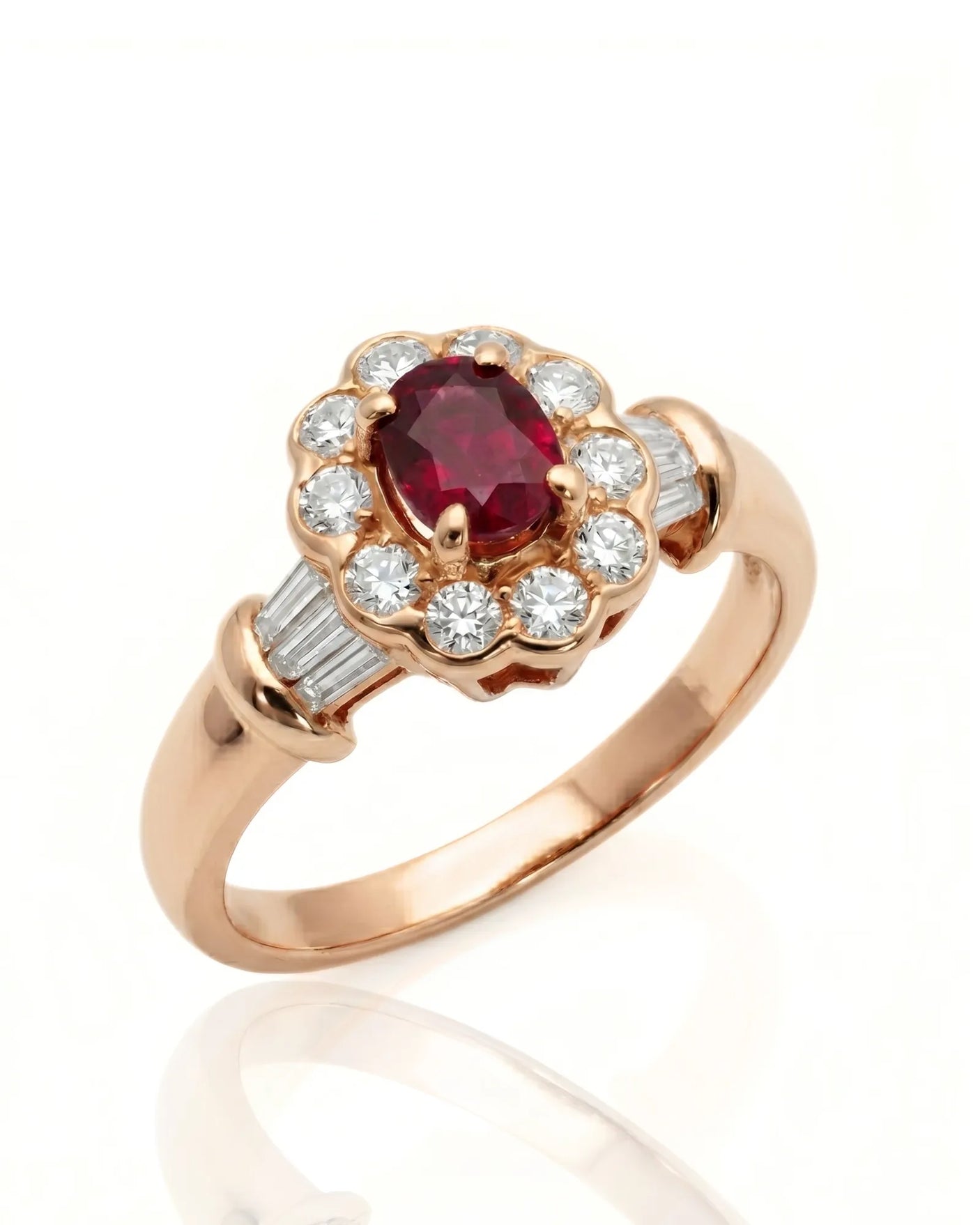 Oval ruby ring with diamond halo and baguette accents in 18K rose gold | SARATTI